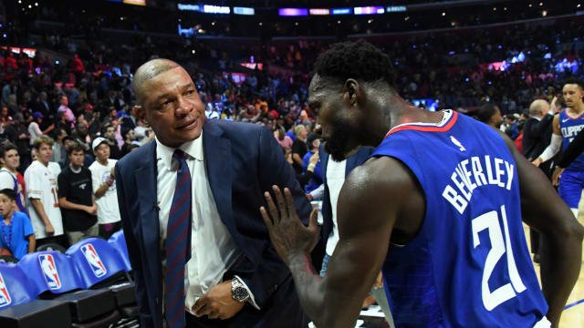 LA Clippers coach Doc Rivers (left) and guard Patrick Beverley (21) celebrate after the game against the Los Angeles Lakers 